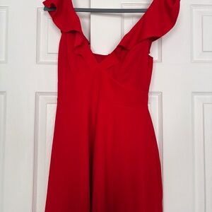 V-neck dress with ruffles at the top